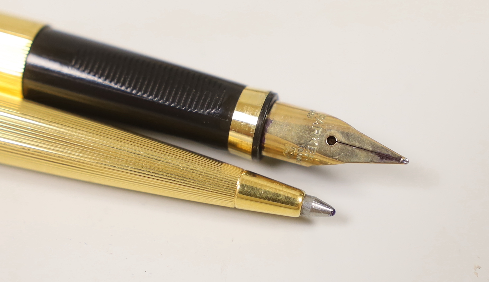 A Parker gold plated fountain pen and ball point pen